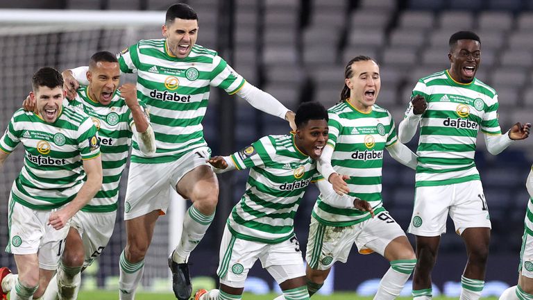Celtic celebrate as Kristoffer Ajer scores the winning penalty against Hearts