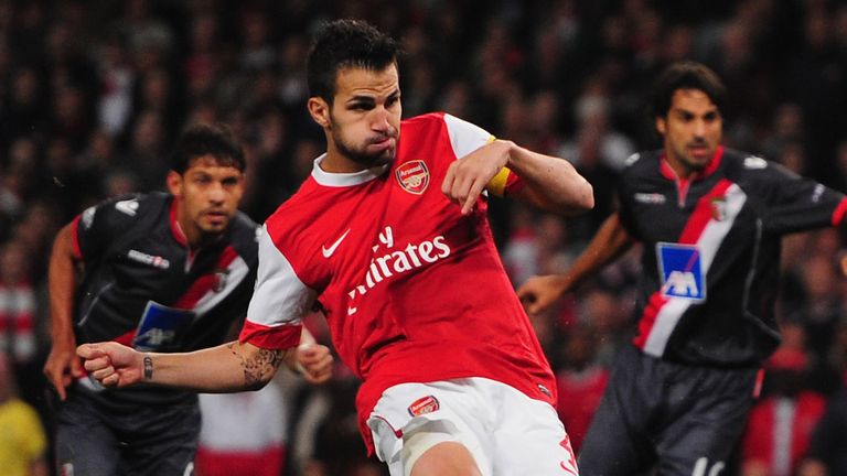 Cesc Fabregas scores with a penalty for Arsenal in the Champions League