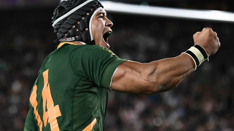 South Africa's wing Cheslin Kolbe celebrates after scoring a try during the Japan 2019 Rugby World Cup final match between England and South Africa at the International Stadium Yokohama in Yokohama on November 2, 2019. (Photo by Anne-Christine POUJOULAT / AFP) (Photo by ANNE-CHRISTINE POUJOULAT/AFP via Getty Images)