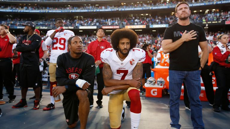 Eric Reid #35 and Colin Kaepernick #7 of the San Francisco 49ers kneel on the sideline during the anthem, as free agent Nate Boyer stands, prior to the game against the San Diego Chargers at Qualcomm Stadium on September 1, 2016 in San Diego, California. The 49ers defeated the Chargers 31-21. (Photo by Michael Zagaris/San Francisco 49ers/Getty Images)  *** Local Caption *** Eric Reid;Colin Kaepernick;Nate Boyer