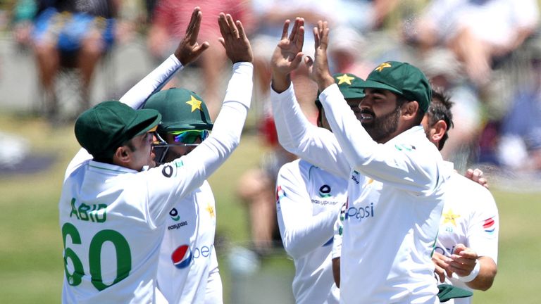 Pakistan celebrate after Haris Sohail's catch removes Kane Williamson in the first Test against New Zealand