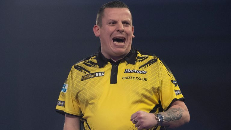WILLIAM HILL WORLD DARTS CHAMPIONSHIP 2021,.ALAXANDRA PALACE,.LONDON.PIC;LAWRENCE LUSTIG.ROUND 3.DAVE CHISNALL V DANNY NOPPERT.DAVE CHISNALL IN ACTION