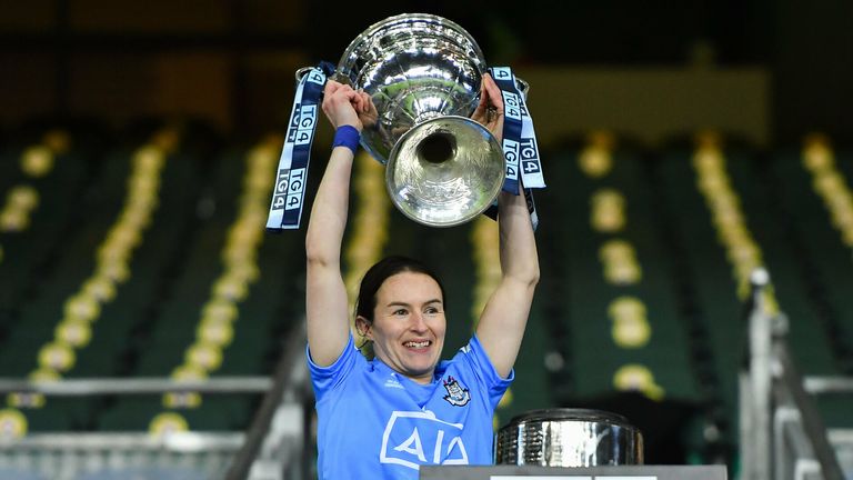 Sinéad Aherne lifts the Brendan Martin Cup
