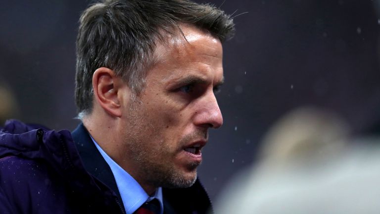 Phil Neville will step down as England head coach in July