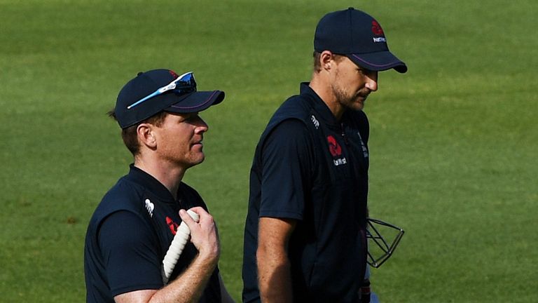 England captain Eoin Morgan leaves the field with team mate Joe Root during a Net Session at Newlands