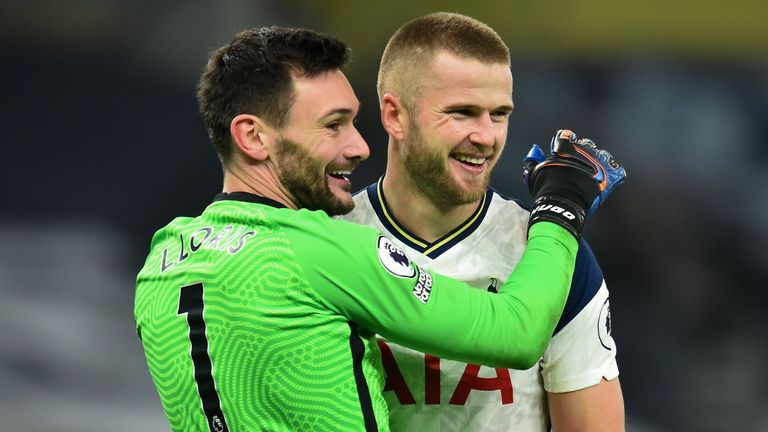 Hugo Lloris and Eric Dier hug after victory in North London derby over Arsenal