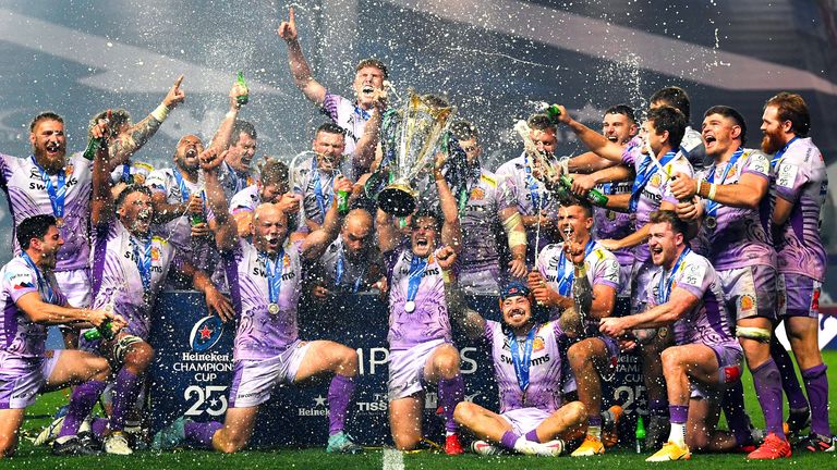 Joe Simmonds of Exeter Chiefs lifts the trophy with his teammates after victory in the Heineken Champions Cup Final match between Exeter Chiefs and Racing 92 at Ashton Gate on October 17, 2020 in Bristol, England. (Photo by Dan Mullan/Getty Images)