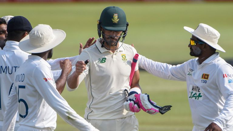 AP Newsroom - South Africa's Faf du Plessis is caught out on 199 and is congratulated by the Sri Lankan team players on day three of the first cricket test match between South Africa and Sri Lanka at Super Sport Park Stadium in Pretoria, South Africa, Monday 28 Dec, 2020. (AP Photo/Catherine Kotze)