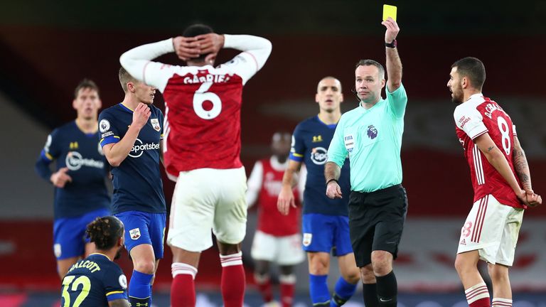 Gabriel is shown a second yellow card for the foul
