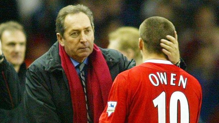 Gerard Houllier embraces Michael Owen as he's substituted during a league match at Anfield in 2004