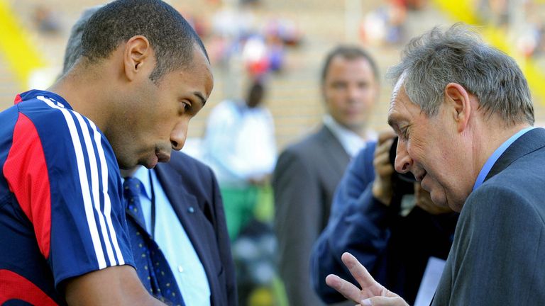 Thierry Henry in discussion with Gerard Houllier