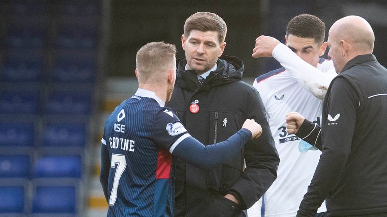 Rangers manager Steven Gerrard speaks with Michael Gardyne at full time