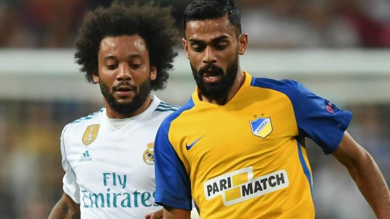 Real Madrid's defender from Brazil Marcelo (L) vies with APOEL Nicosia's aforward from Norway Ghayas Zahid during the UEFA Champions League football match Real Madrid CF vs APOEL FC at the Santiago Bernabeu stadium in Madrid on September 13, 2017. 