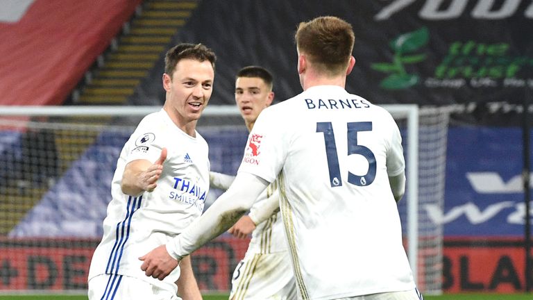 Harvey Barnes (right) celebrates his goal with Jonny Evans