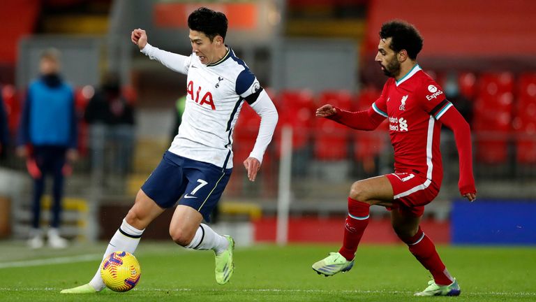 Heung-Min Son and Mohamed Salah in action during Tottenham's trip to Liverpool