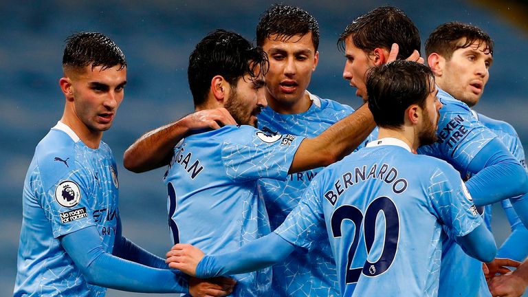 Ilkay Gundogan (2L) celebrates scoring for Manchester City against Newcastle