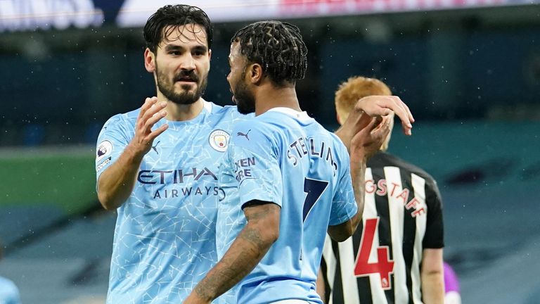 Ilkay Gundogan celebrates with Raheem Sterling after scoring for Manchester City vs Newcastle