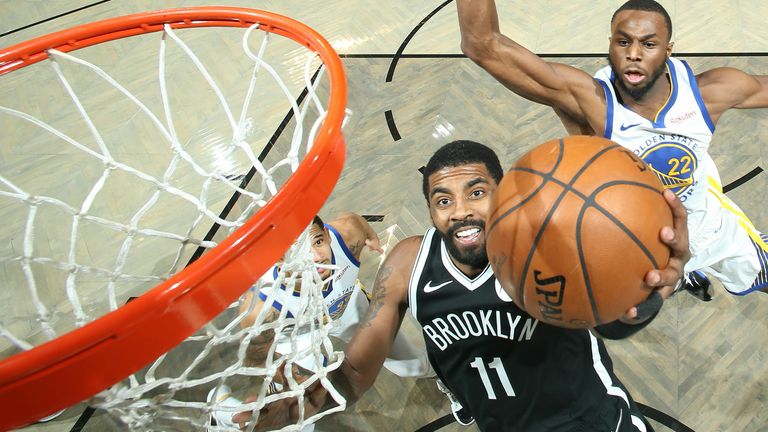 Kyrie Irving #11 of the Brooklyn Nets drives to the basket during the game against the Golden State Warriors on December 22, 2020