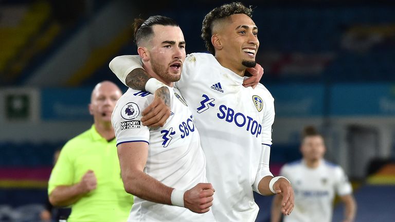 Leeds United's Jack Harrison celebrates his goal with Raphinha