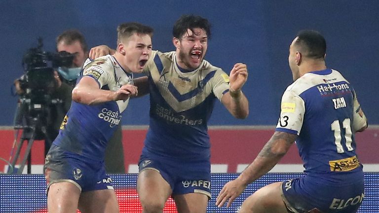 Wigan Warriors v St Helens - Betfred Super League - Grand Final - KCOM Stadium
St Helens Jack Welsby (left) celebrates scoring the winning try during the Betfred Super League Grand Final at the KCOM Stadium, Hull.