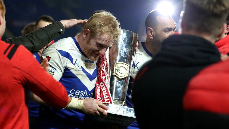 Wigan Warriors v St Helens - Betfred Super League - Grand Final - KCOM Stadium
St Helens James Graham celebrates with the trophy after winning the Betfred Super League Grand Final at the KCOM Stadium, Hull.