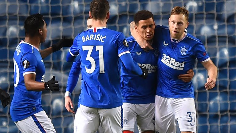 James Tavernier is congratulated after hauling Rangers level at 2-2