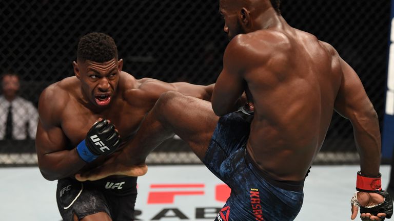 In this handout image provided by UFC, (L-R) Joaquin Buckley punches Impa Kasanganay in their middleweight bout during the UFC Fight Night event inside Flash Forum on UFC Fight Island on October 11, 2020 in Yas Island, Abu Dhabi, United Arab Emirates.