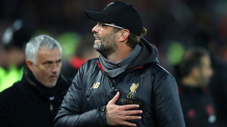 LIVERPOOL, ENGLAND - DECEMBER 16: Jurgen Klopp, Manager of Liverpool and Jose Mourinho, Manager of Manchester United looks on prior to the Premier League match between Liverpool FC and Manchester United at Anfield on December 16, 2018 in Liverpool, United Kingdom. (Photo by Clive Brunskill/Getty Images)
