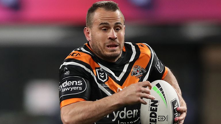 SYDNEY, AUSTRALIA - JULY 04: Josh Reynolds of the Tigers runs the ball during the round eight NRL match between the Wests Tigers and the Penrith Panthers at Bankwest Stadium on July 04, 2020 in Sydney, Australia. (Photo by Mark Kolbe/Getty Images)
