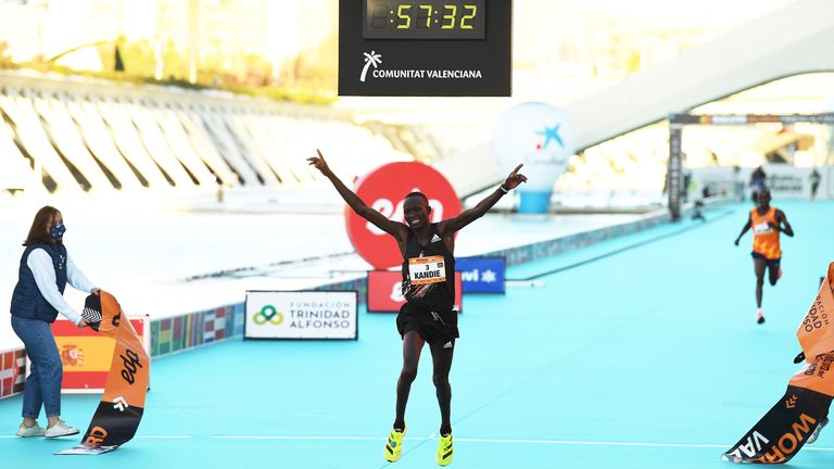 VALENCIA, SPAIN - DECEMBER 06: Kibiwott Kandie of Kenya breaks the Men’s Half Marathon World Record wearing the adidas adizero adios pro during the Valencia Marathon on December 06, 2020 in Valencia, Spain. (Photo by David Ramos/Getty Images for adidas)