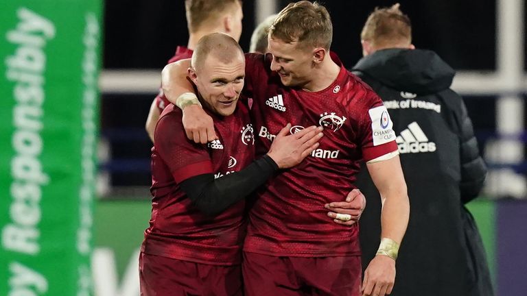 Keith Earls (L) and Mike Haley celebrate after beating Clermont