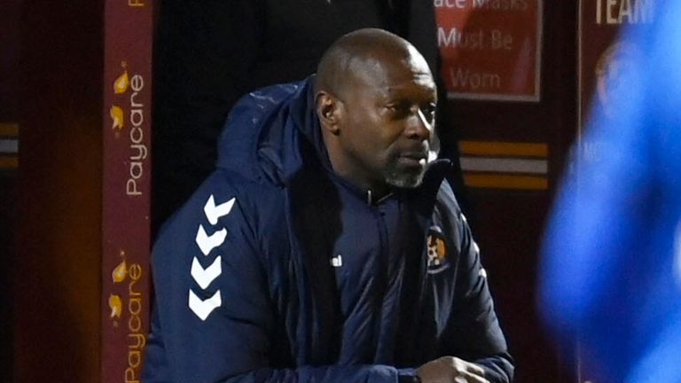 Kilmarnock manager Alex Dyer takes a knee ahead of kick-off in the Scottish Premiership match against Motherwell