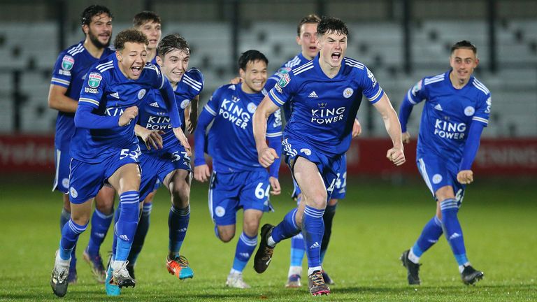 Darragh O'Connor of Leicester City U21 and team mates celebrate after winning a penalty shoot against Salford City 