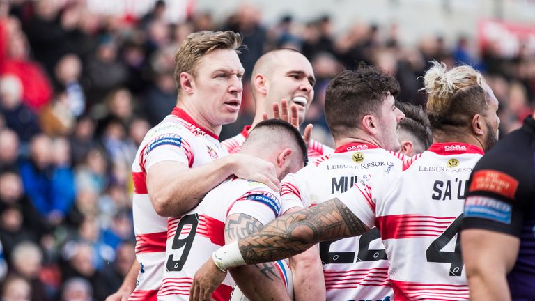  Leigh celebrate Liam Hood's try.