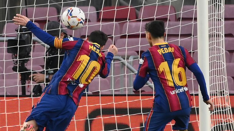 Lionel Messi scores for Barcelona against Elche