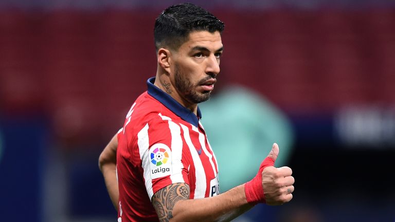 Luis Suarez celebrates scoring for Atletico Madrid against Getafe