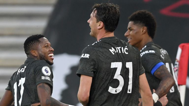 Fred, Nemanja Matic and Marcus Rashford celebrate Manchester United's third goal against Southampton