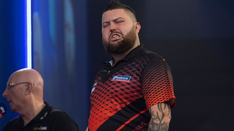Michael Smith suffered a shock second-round exit to Jason Lowe at the PDC World Darts Championship