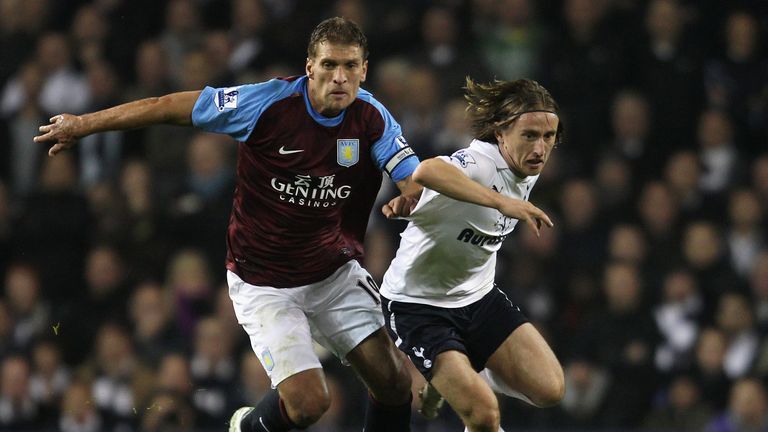 Luka Modric of Spurs and Stiliyan Petrov of Aston Villa fight for the ball during the Barclays Premier League match between Tottenham Hotspur and Aston Villa at White Hart Lane on November 21, 2011 in London, England