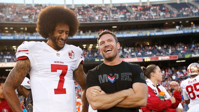 Colin Kaepernick #7 of the San Francisco 49ers talks with free agent Nate Boyer on the sideline prior to the game against the San Diego Chargers at Qualcomm Stadium on September 1, 2016 in San Diego, California. The 49ers defeated the Chargers 31-21. (Photo by Michael Zagaris/San Francisco 49ers/Getty Images)  *** Local Caption *** Colin Kaepernick;Nate Boyer