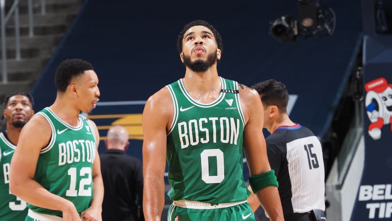 Jayson Tatum #0 of the Boston Celtics looks on during the game against the Indiana Pacers on December 29, 2020 at Bankers Life Fieldhouse in Indianapolis, Indiana. 