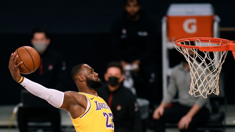 LeBron James #23 of the Los Angeles Lakers dunks during the first half against the Portland Trail Blazers at Staples Center on December 28, 2020 in Los Angeles, California. 
