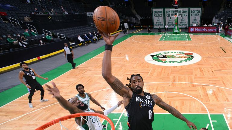 DeAndre Jordan #6 of the Brooklyn Nets drives to the basket against the Boston Celtics during a game on December 25, 2020