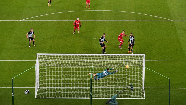 Karl Darlow gets across to keep out Roberto Firmino's goalbound header