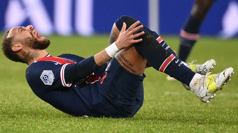 Paris Saint-Germain&#39;s Brazilian forward Neymar reacts after getting tackled during the French L1 football match between Paris Saint-Germain (PSG) and Lyon (OL), on December 13, 2020 at the Parc des Princes stadium in Paris. (Photo by FRANCK FIFE / AFP) (Photo by FRANCK FIFE/AFP via Getty Images)