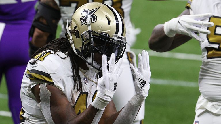 Alvin Kamara #41 of the New Orleans Saints celebrates scoring his fourth touchdown of the game during the third quarter against the Minnesota Vikings at Mercedes-Benz Superdome on December 25, 2020 in New Orleans, Louisiana.
