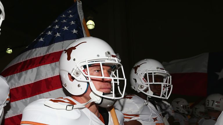 Nate Boyer #37 of the Texas Longhorns prepares to enter the field before a game against the Oklahoma Sooners at Cotton Bowl on October 11, 2014 in Dallas, Texas