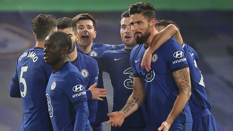 Chelsea players celebrate with Olivier Giroud after he opened the scoring against Aston Villa
