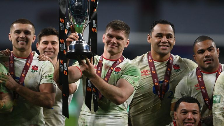 Owen Farrell lifts the Autumn Nations Cup after England beat France in sudden death extra time