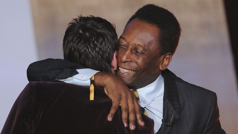 Barcelona's Argentinian forward Lionel Messi (L) receives from Brazilian football legend Pele the FIFA/FIFPro World XI award on January 9, 2012 at the Kongresshaus in Zurich during the FIFA Ballon d'Or event. AFP PHOTO / FRANCK FIFE (Photo credit should read FRANCK FIFE/AFP via Getty Images)